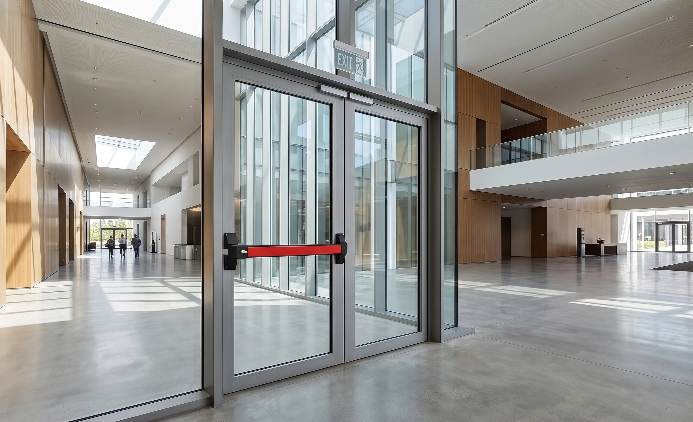 Storefront door hardware installation in a commercial entrance